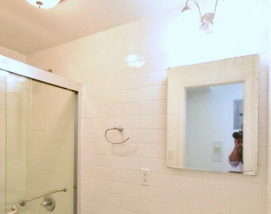 215 East 10th Street - Photo Thumbnail 3