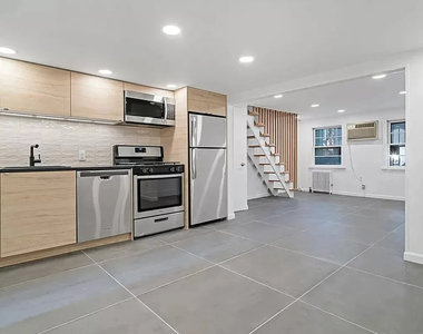 66 Devoe St - Photo Thumbnail 6