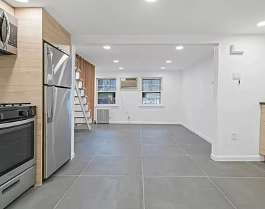 66 Devoe St - Photo Thumbnail 7