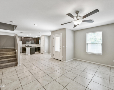 8047 W Albeniz Place - Photo Thumbnail 2