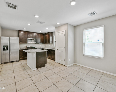 8047 W Albeniz Place - Photo Thumbnail 3