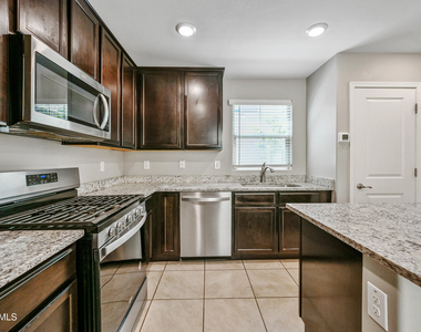8047 W Albeniz Place - Photo Thumbnail 5