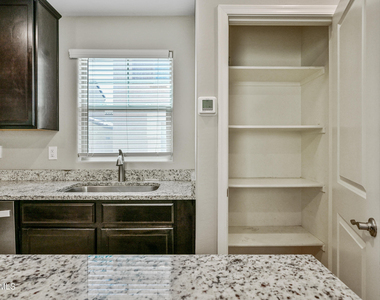 8047 W Albeniz Place - Photo Thumbnail 7