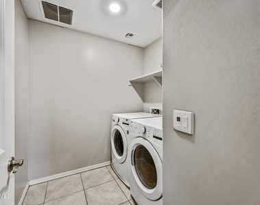 8047 W Albeniz Place - Photo Thumbnail 20
