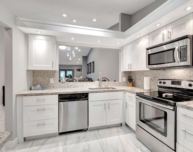 10927 Dolphin Palm Court - Photo Thumbnail 10