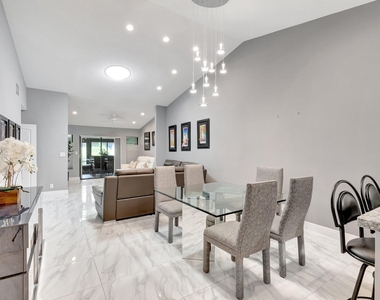 10927 Dolphin Palm Court - Photo Thumbnail 5