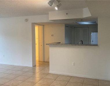 5045 Wiles Road - Photo Thumbnail 3
