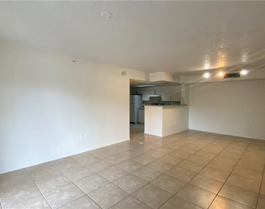 5045 Wiles Road - Photo Thumbnail 2