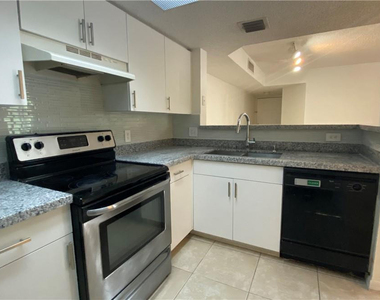 5045 Wiles Road - Photo Thumbnail 1