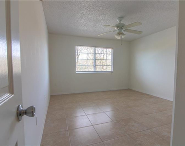 5045 Wiles Road - Photo Thumbnail 11