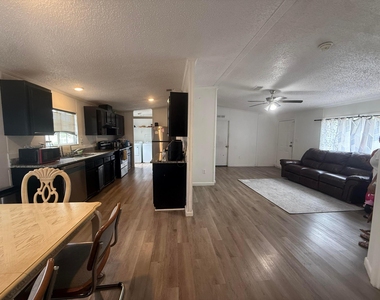 10548 Sw Sandalfoot Boulevard - Photo Thumbnail 3