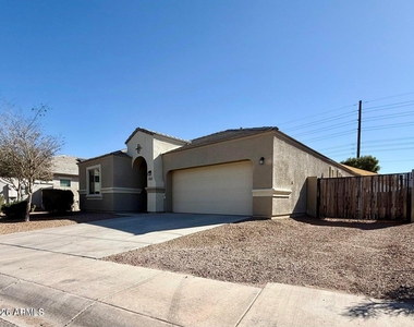 40865 W Hensley Way - Photo Thumbnail 1