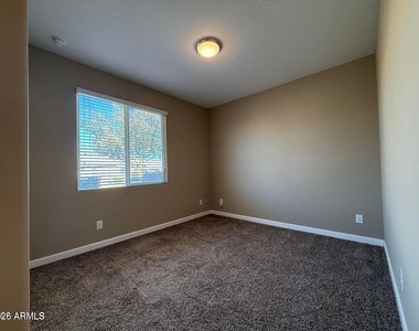 40865 W Hensley Way - Photo Thumbnail 4