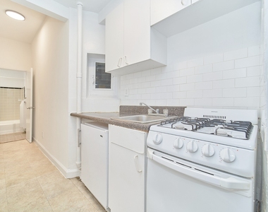 353 W 44th Street - Photo Thumbnail 3