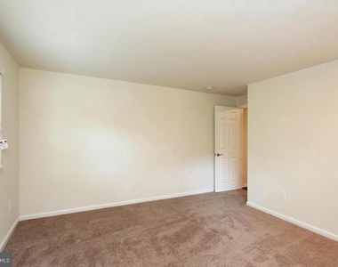 6915 Wilson Lane - Photo Thumbnail 3