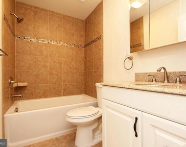 6915 Wilson Lane - Photo Thumbnail 10