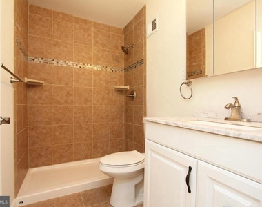 6915 Wilson Lane - Photo Thumbnail 14
