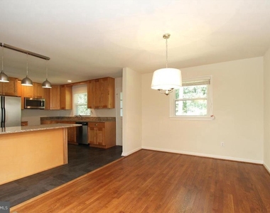 6915 Wilson Lane - Photo Thumbnail 5