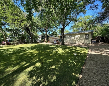 6004 Woodview Ave - Photo Thumbnail 1