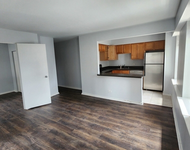 40 E 9th Street - Photo Thumbnail 1