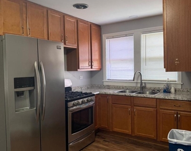 7529 W Rosedale Avenue - Photo Thumbnail 4