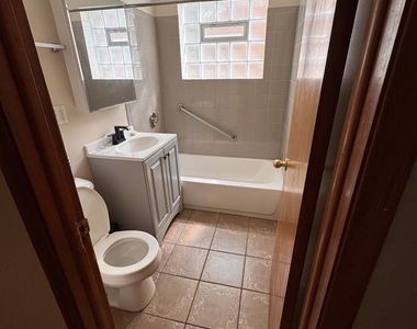 706 E 106th Street - Photo Thumbnail 4