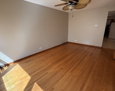 706 E 106th Street - Photo Thumbnail 3