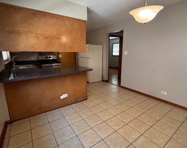 706 E 106th Street - Photo Thumbnail 8