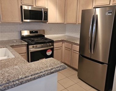 9901 Trailwood Drive - Photo Thumbnail 3