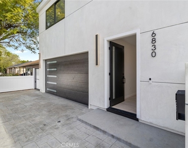 6830 N Lubao Avenue - Photo Thumbnail 3
