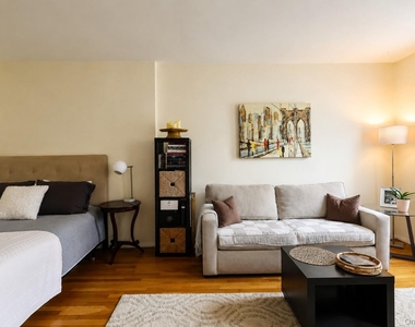 99-15 66 Avenue - Photo Thumbnail 2
