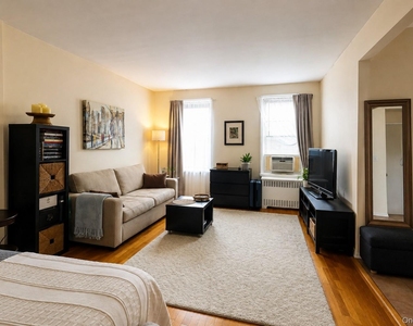 99-15 66 Avenue - Photo Thumbnail 3