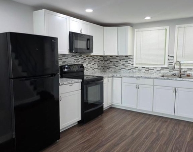 2717 Woodland Avenue - Photo Thumbnail 2