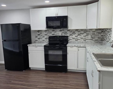 2717 Woodland Avenue - Photo Thumbnail 1