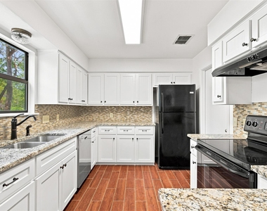 10010 Wildflower Ln - Photo Thumbnail 11