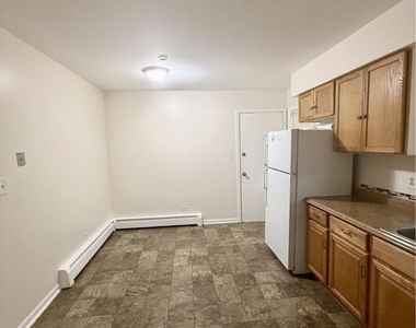 6235 N Mozart Street - Photo Thumbnail 3