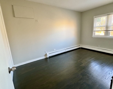 6235 N Mozart Street - Photo Thumbnail 7