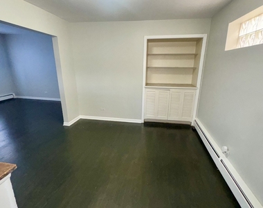 6235 N Mozart Street - Photo Thumbnail 2