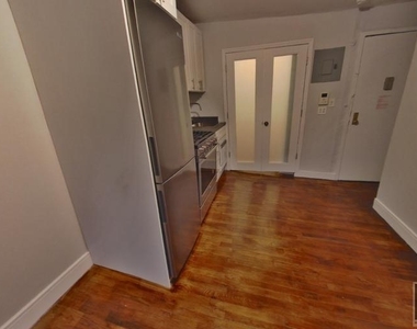 East 5 Street - Photo Thumbnail 3