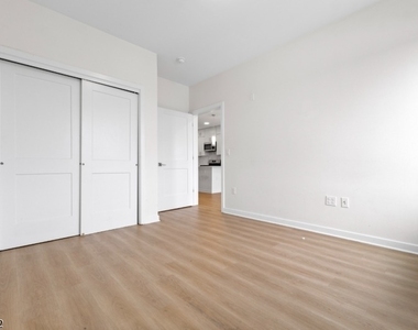321 E 3rd St - Photo Thumbnail 25