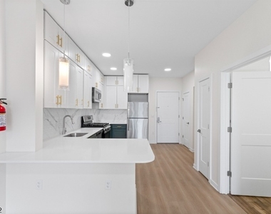 321 E 3rd St - Photo Thumbnail 17