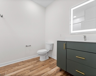 321 E 3rd St - Photo Thumbnail 27