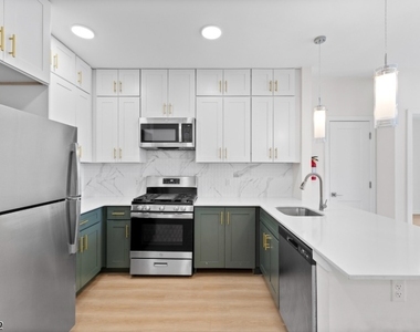 321 E 3rd St - Photo Thumbnail 24