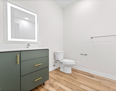 321 E 3rd St - Photo Thumbnail 15