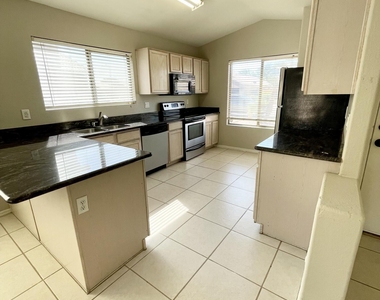 11434 W Cambridge Avenue - Photo Thumbnail 2