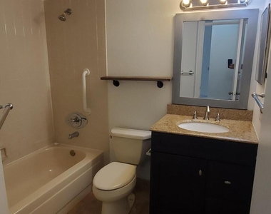 8721 Wiles Road - Photo Thumbnail 3
