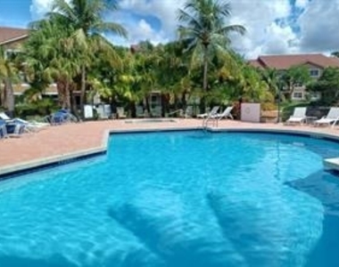 8721 Wiles Road - Photo Thumbnail 11