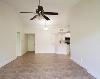 8721 Wiles Road - Photo Thumbnail 1
