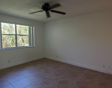 8721 Wiles Road - Photo Thumbnail 5