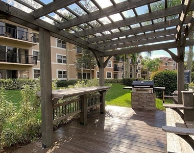 8721 Wiles Road - Photo Thumbnail 8